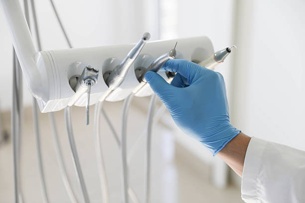 Professional Tooth Extraction technician working in Columbus, NM